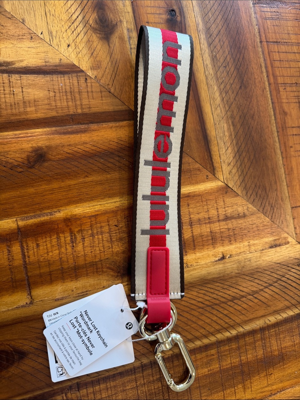 Brand New Lululemon Red, Cream & Brown Logo Never Lost Keychaiwith Gold Hardware